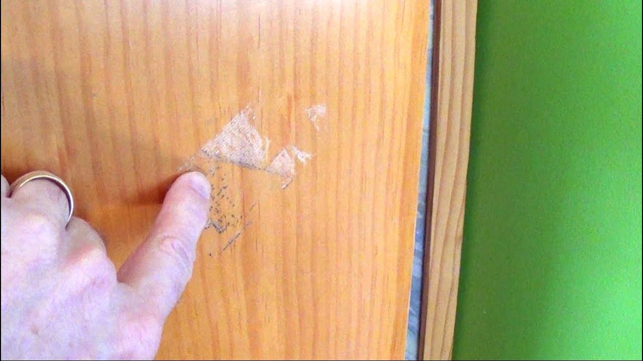 how to get adhesive off wood